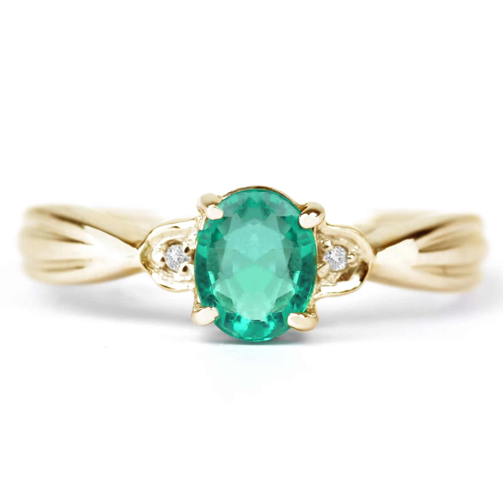 Oval Emerald Solitaire Ring with Diamond