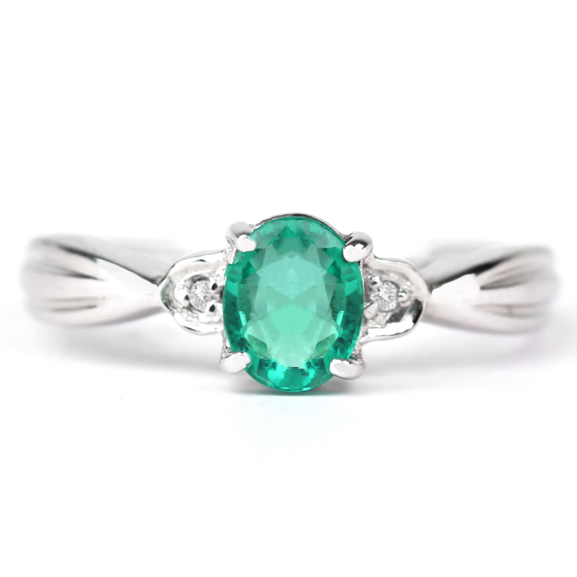 Oval Emerald Solitaire Ring with Diamond