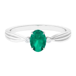 Oval Emerald Solitaire Ring with Diamond