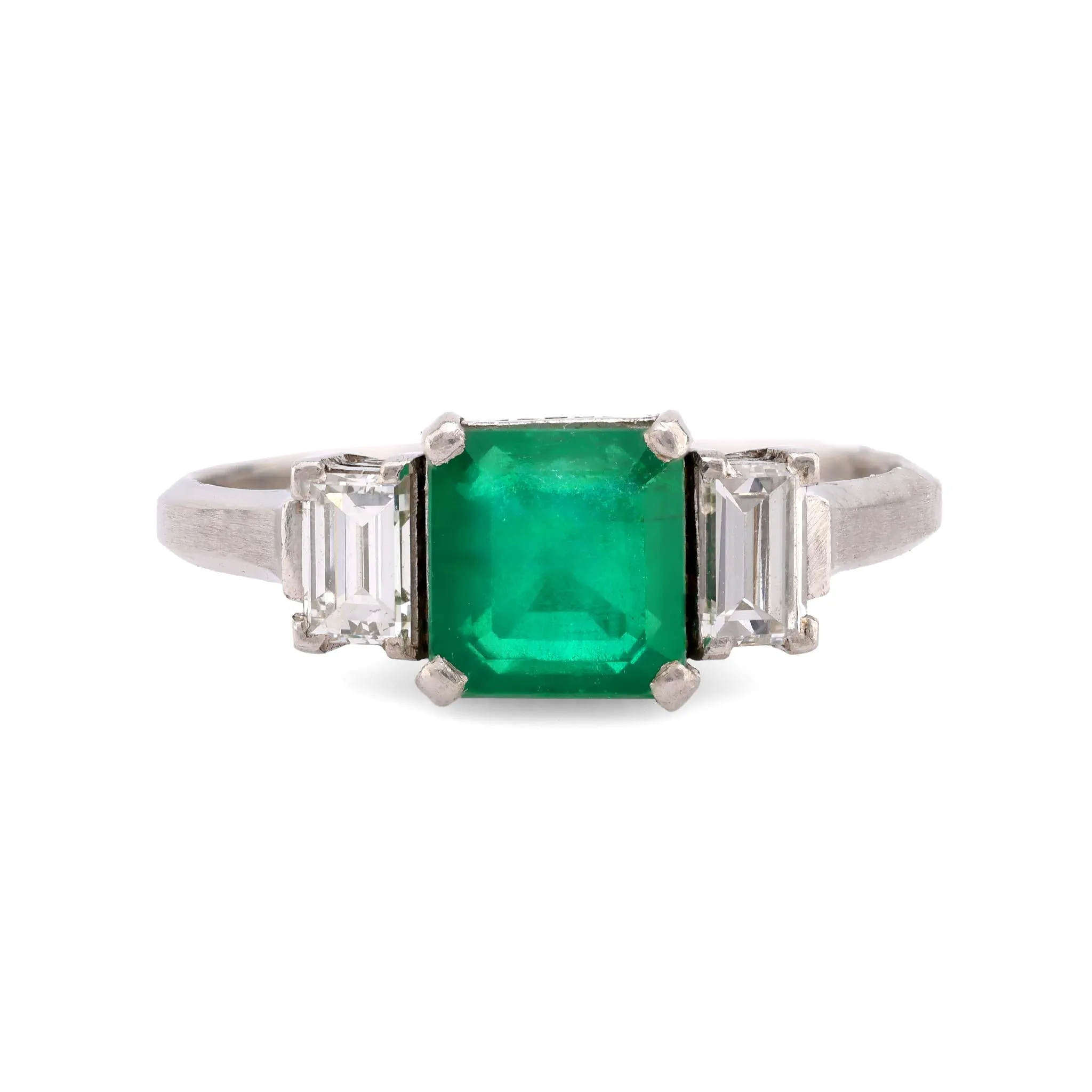 Timeless emerald diamond platinum three stone ring